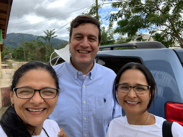 Alda and Reina Diaz with Father Ferdinando Castriotti. 