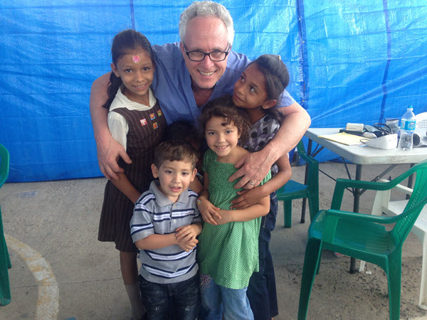 Alda and Reina Diaz with Father Ferdinando Castriotti. 